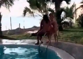 Zoophilic sex action by the pool